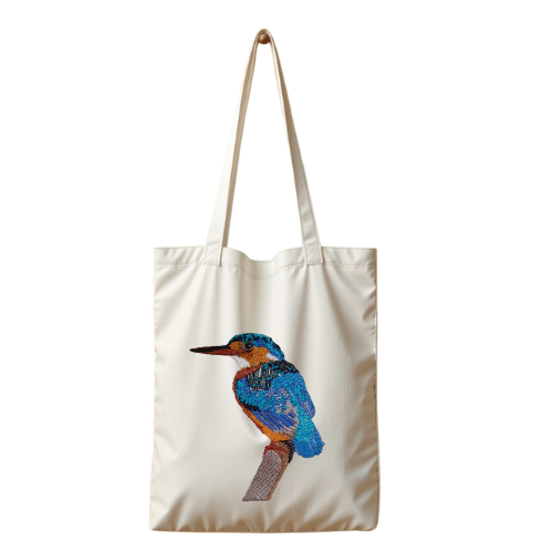Beige tote bag with a embroidered bird design on a white background