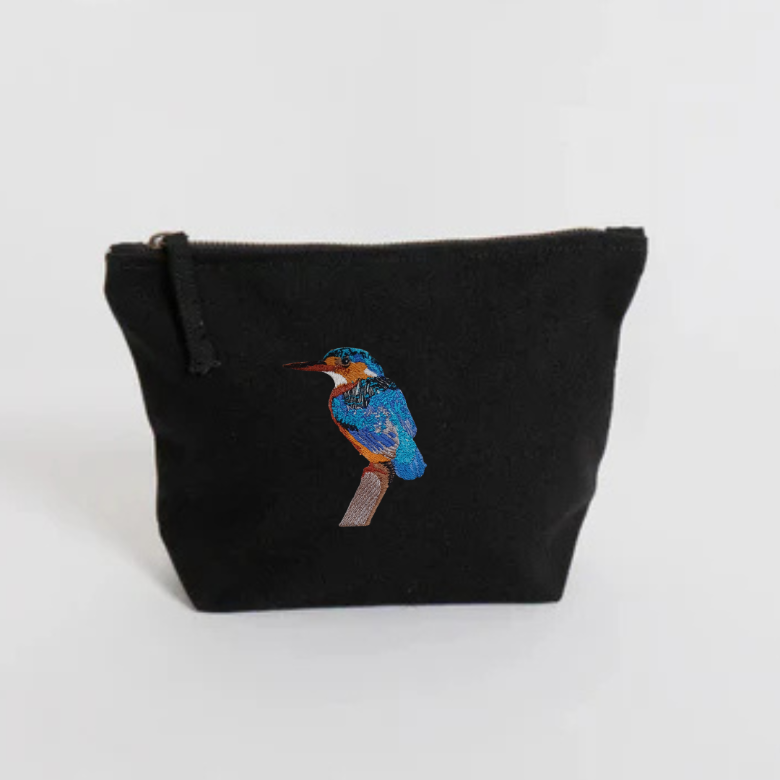 Black pouch with an embroidered bird on a white background