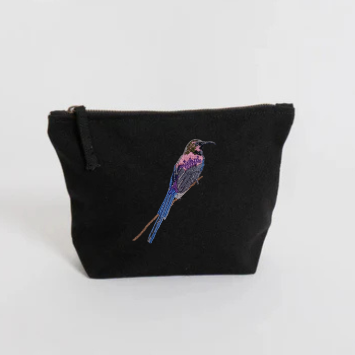Black pouch with embroidered bird on a white background