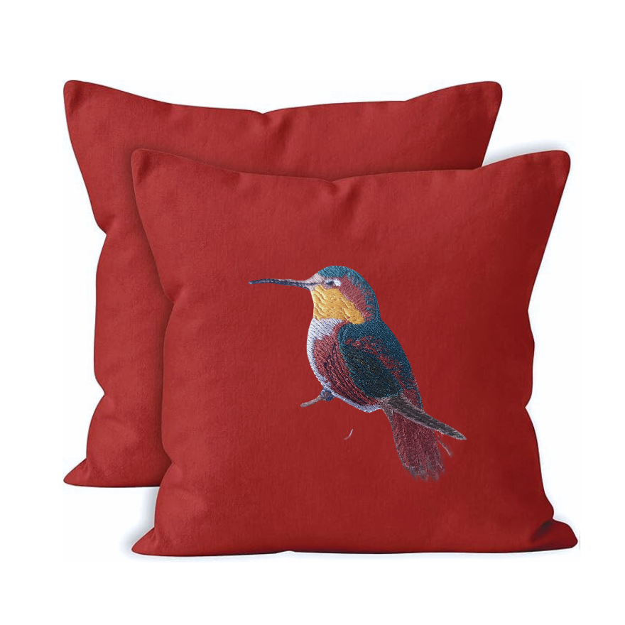 Red canvas cushion covers  with embroidered bird design 