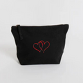 Black pouch with red heart embroidery  on a white background