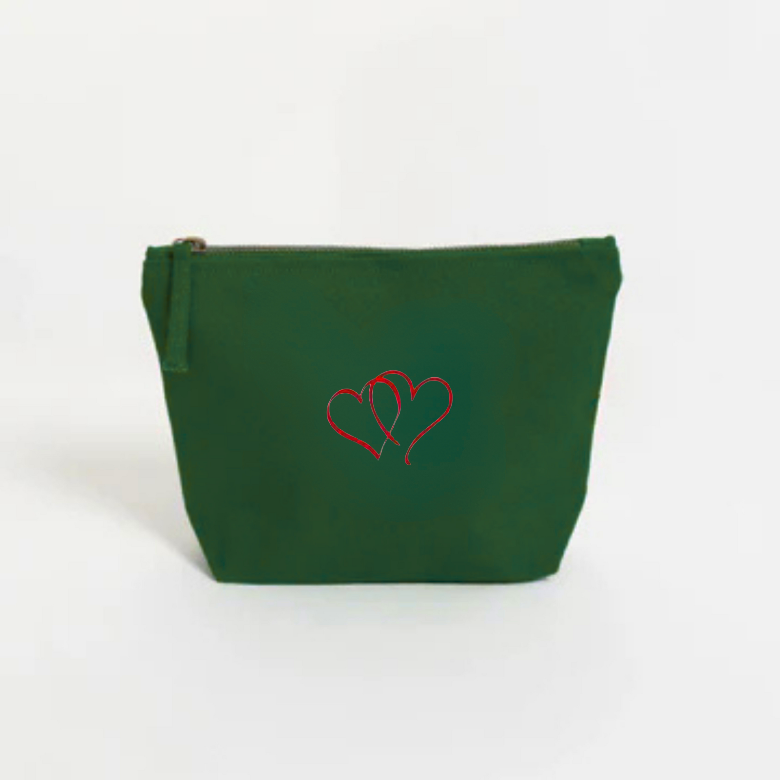 Green pouch with red hearts embroidery on a white background
