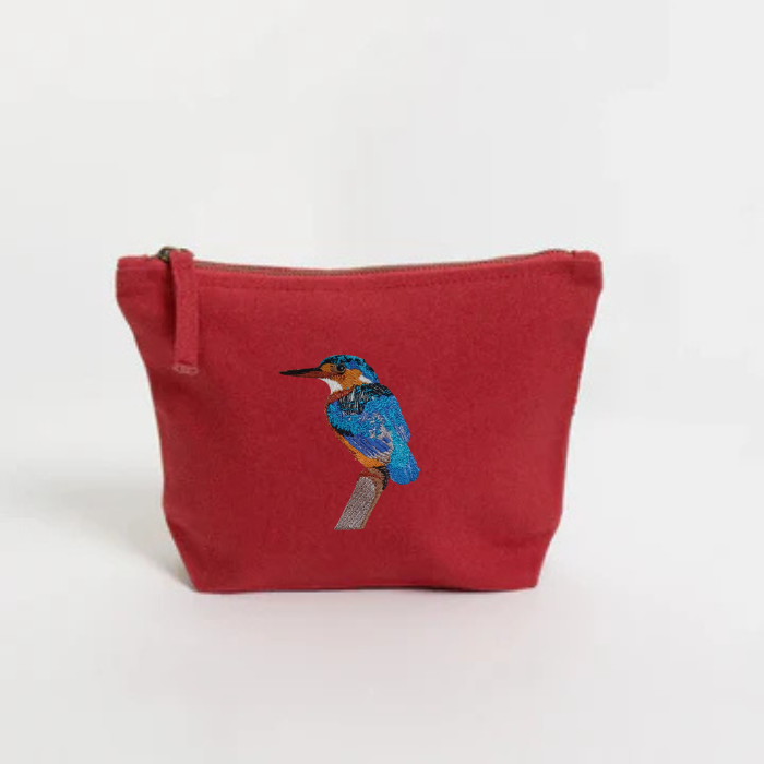 Red pouch with an embroidered bird  on a white background