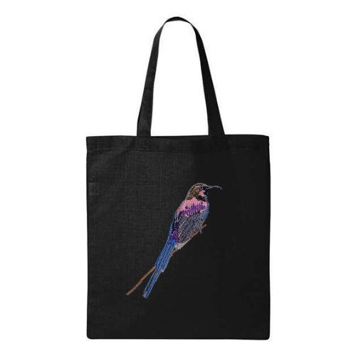 Black tote bag with a embroidered bird design on a white background