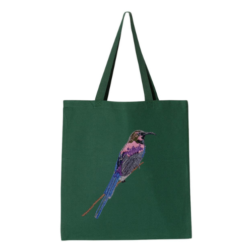 Green tote bag with a bird embroidery on a white background