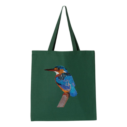 Green tote bag with a  bird embroidery on a white background