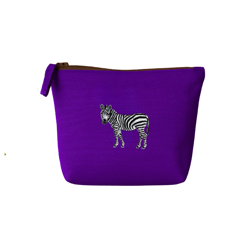 Purple pouch with a zebra embroidery  on a white background