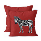 Red cushion cover with a zebra design on a white background