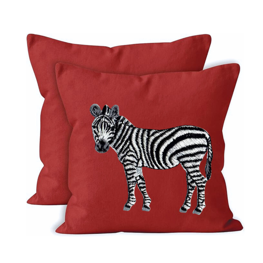 Red cushion cover with a zebra design on a white background