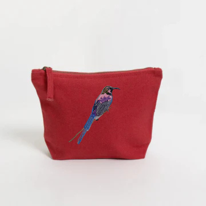 Red pouch with a bird Embroidery on a white background