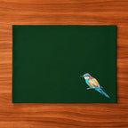 Handmade Ilisah Bee Eater Embroidery table mats in navy blue, set of 4, made from 100% cotton canvas for stylish dining.