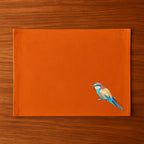 Handmade Ilisah Bee Eater Embroidery table mats in navy blue, set of 4, made from 100% cotton canvas for stylish dining.