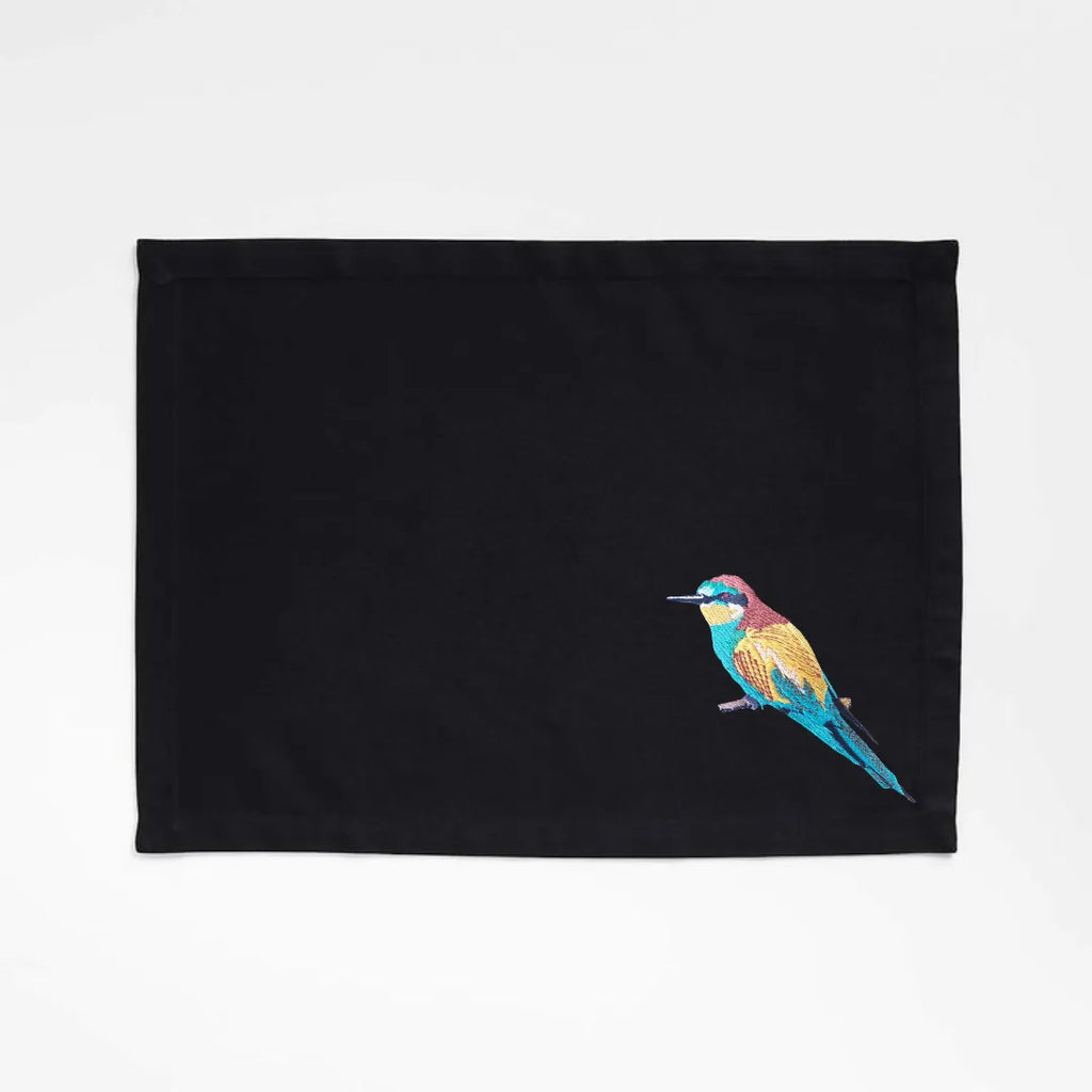 Handmade Ilisah Bee Eater Embroidery table mats in navy blue, set of 4, made from 100% cotton canvas for stylish dining.
