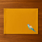 Handmade Ilisah Bee Eater Embroidery table mats in navy blue, set of 4, made from 100% cotton canvas for stylish dining.