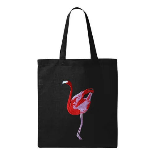 Canvas Tote in Flamingo by ILISAH, featuring a vibrant pink flamingo design on durable 100% cotton canvas, perfect for eve...