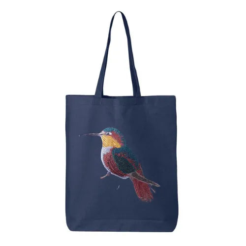 ILISAH Canvas Tote featuring a vibrant hummingbird design, available in black, burnt orange, and navy blue, perfect for ev...