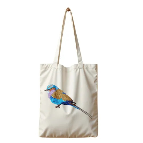 Lilac Breasted Roller Canvas Tote by ILISAH, 100% cotton, perfect for daily use, shown in navy blue variant.