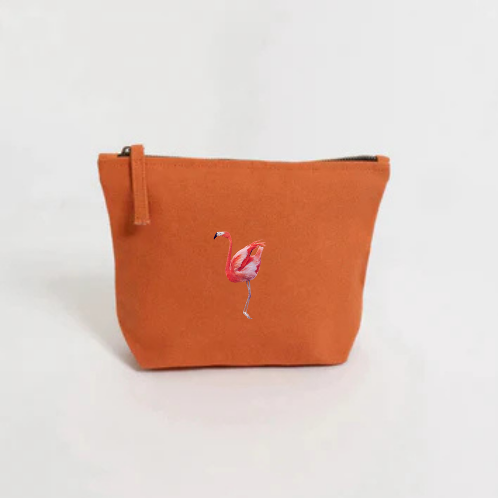 Orange pouch with a flamingo embroidery design 