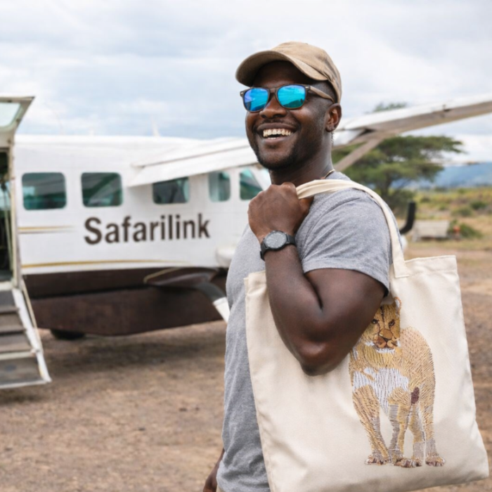 Natural tote bag with a lion embroidery design 