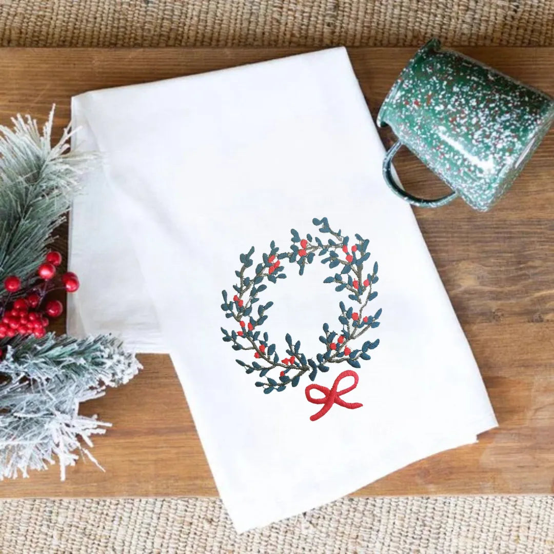 Handmade Ilisah Christmas Kitchen Towel with a festive wreath motif, 100% cotton, soft and absorbent, perfect for holiday ...