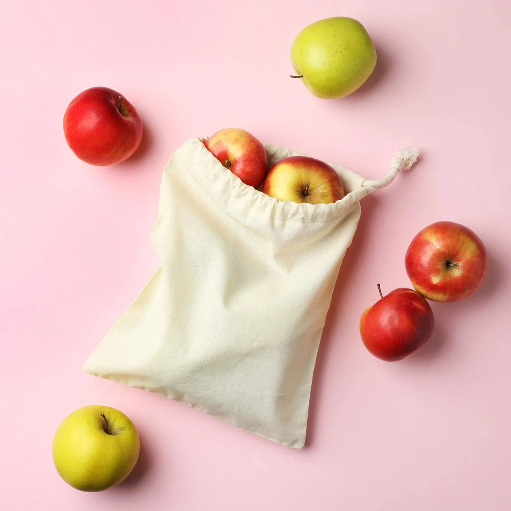 Set of 3 ILISAH cotton produce bags in natural color, perfect for zero-waste food storage in the kitchen.
