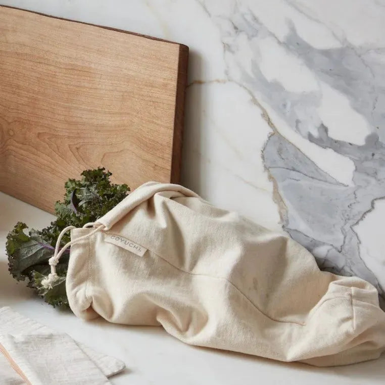 Set of 3 ILISAH cotton produce bags in natural color, perfect for zero-waste food storage in the kitchen.