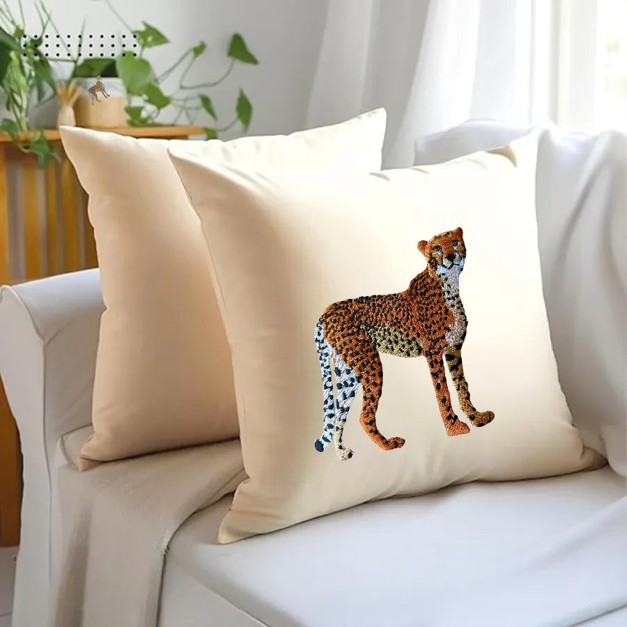Handmade ILISAH cheetah embroidery cushion covers in beige and white, perfect for refreshing your chair or sofa.
