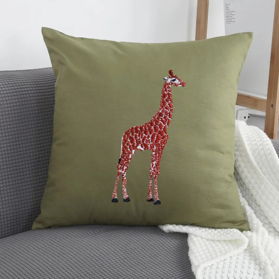 Giraffe embroidery cushion covers by ILISAH in beige and white, perfect for refreshing your chair or sofa with artisan charm.