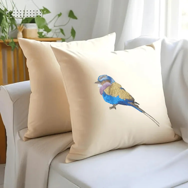 Handmade ILISAH lilac-breasted roller embroidered cushion cover in vibrant colors, perfect for refreshing your couch or bed.