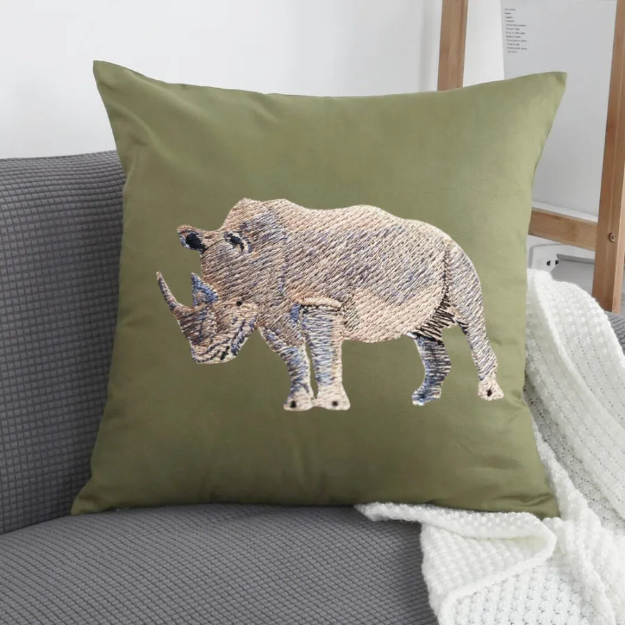Handmade ILISAH Rhino Embroidery cushion covers in beige and white, perfect for refreshing chairs and sofas with artisan c...