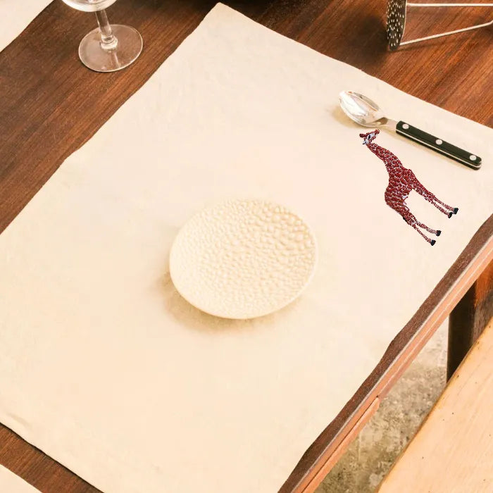 Handmade Ilisah Giraffe Embroidery table mats in beige white, set of 4, 100% cotton canvas, perfect for stylish dining.