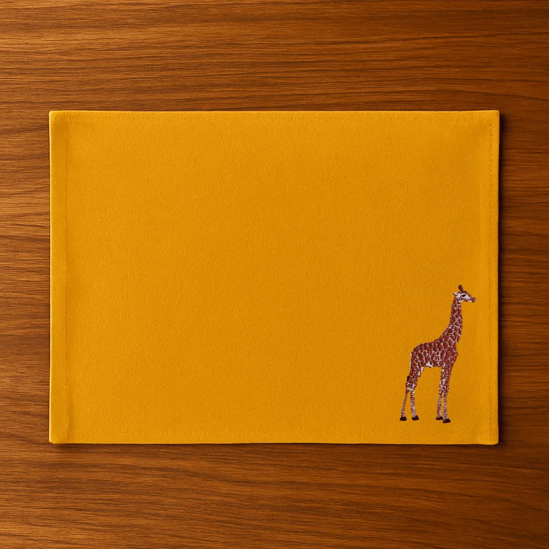 Handmade Ilisah Giraffe Embroidery table mats in beige white, set of 4, 100% cotton canvas, perfect for stylish dining.