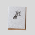 Handmade eco-friendly greeting card featuring a giraffe by ILISAH, crafted from recycled water hyacinth paper, perfect for...