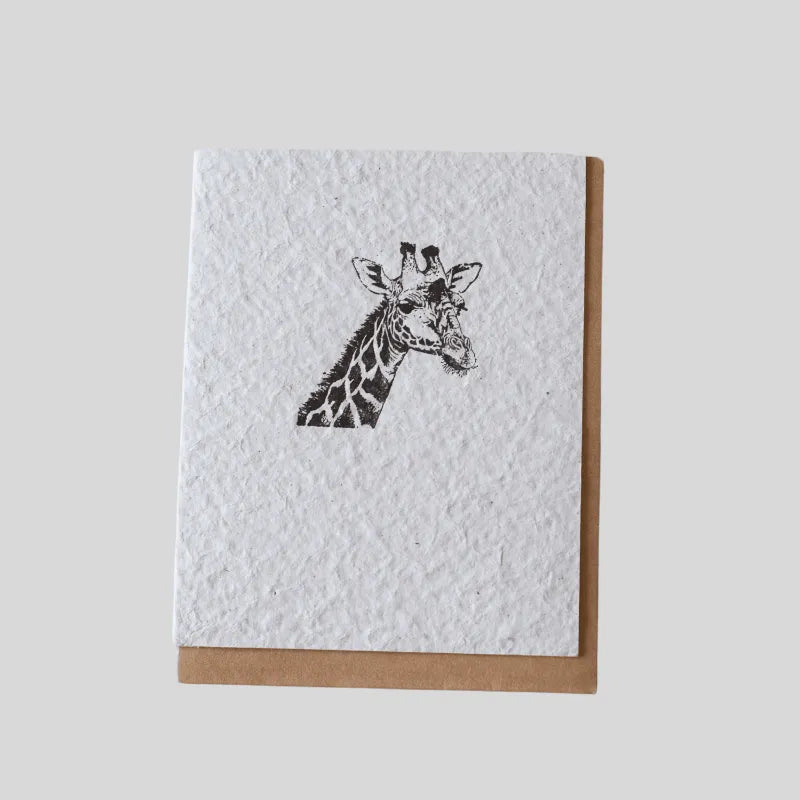 Handmade eco-friendly greeting card featuring a giraffe by ILISAH, crafted from recycled water hyacinth paper, perfect for...