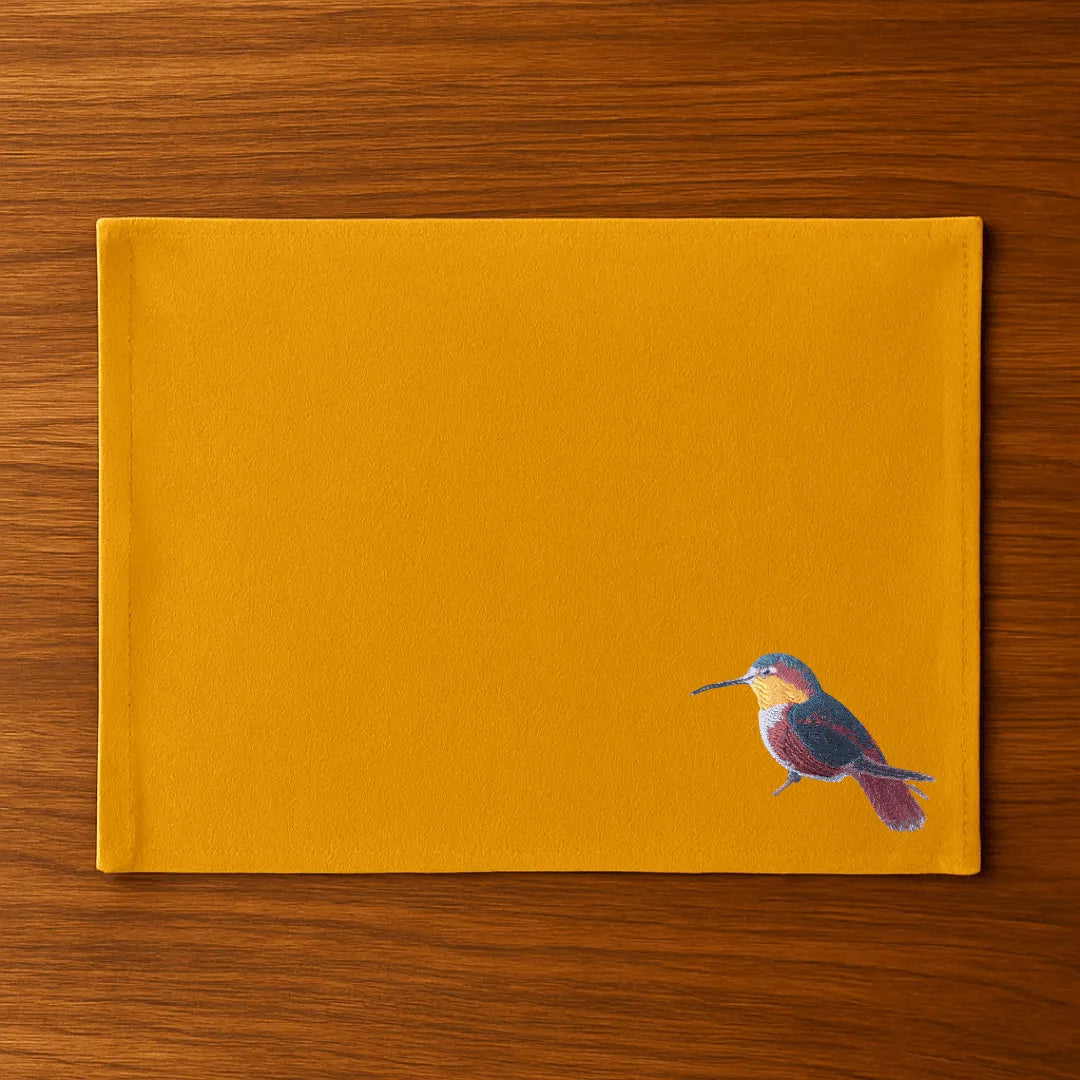 Handmade rectangular table mats with Humming Bird embroidery by Ilisah, available in mustard, burnt orange, and beige whit...
