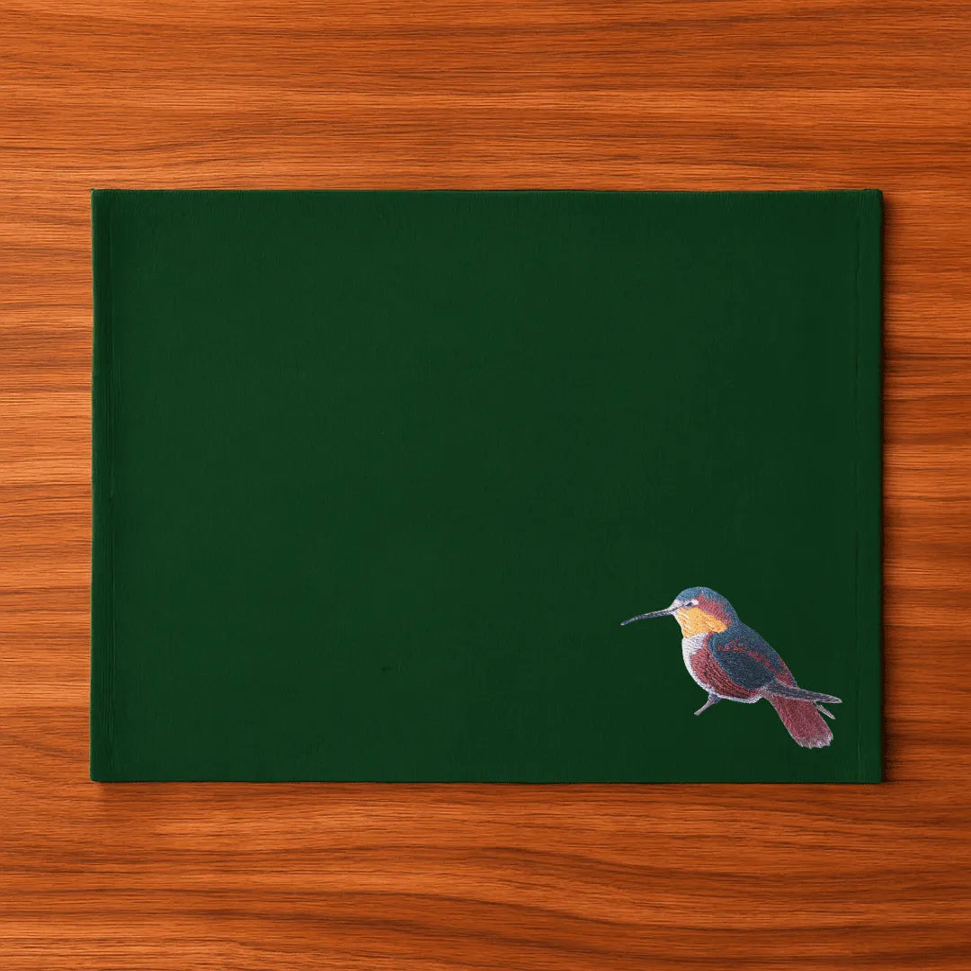 Handmade rectangular table mats with Humming Bird embroidery by Ilisah, available in mustard, burnt orange, and beige whit...