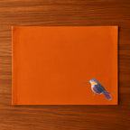 Handmade rectangular table mats with Humming Bird embroidery by Ilisah, available in mustard, burnt orange, and beige whit...