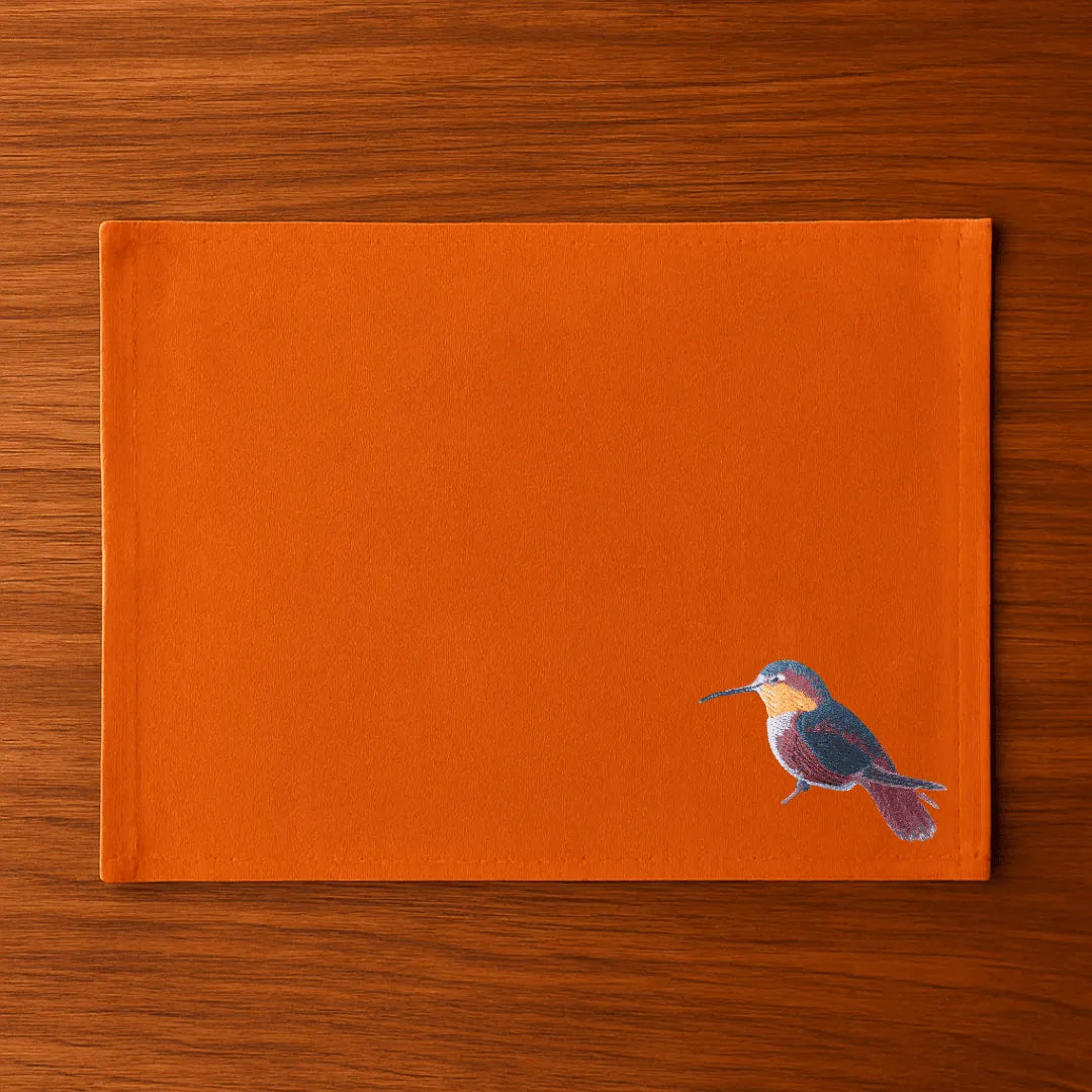 Handmade rectangular table mats with Humming Bird embroidery by Ilisah, available in mustard, burnt orange, and beige whit...