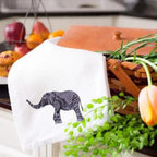 Elephant-embroidered kitchen towels by Ilisah, crafted from 100% cotton, showcasing vibrant colors and intricate designs, ...