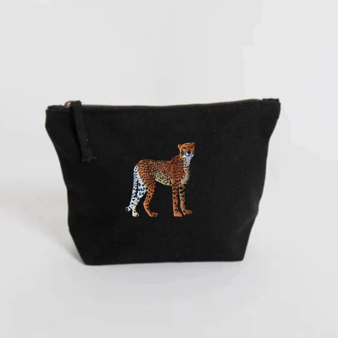 Handmade ILISAH Cheetah canvas make up pouch in black, perfect for organizing daily essentials or travel items.