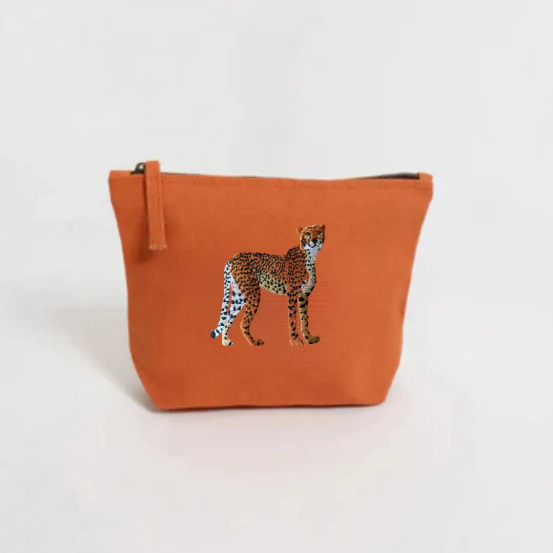 Handmade ILISAH Cheetah canvas make up pouch in black, perfect for organizing daily essentials or travel items.