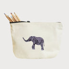 Handmade ILISAH Elephant Make Up Pouch in Burnt Orange, a compact canvas organizer for makeup and travel essentials.