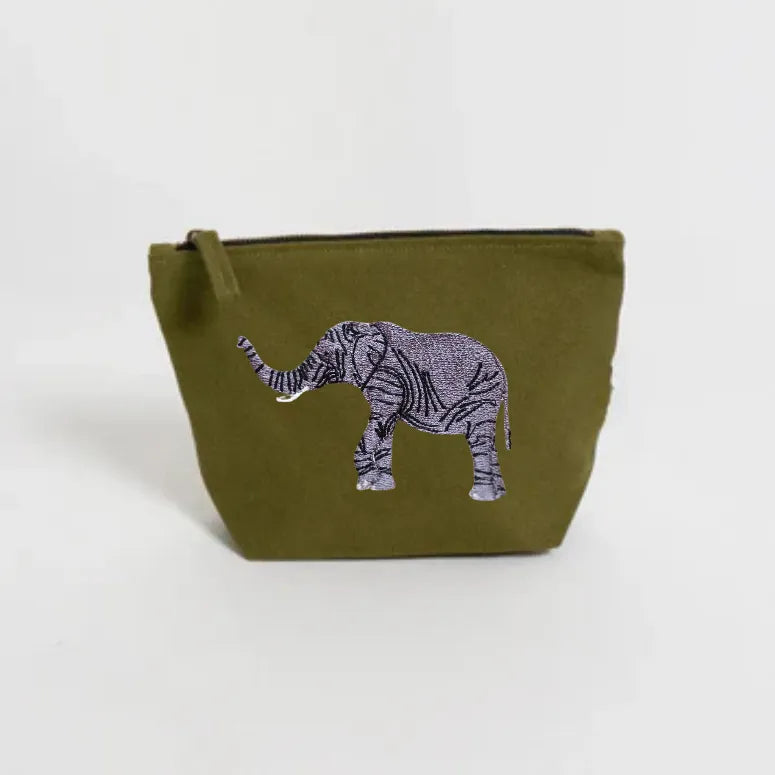 Handmade ILISAH Elephant Make Up Pouch in Burnt Orange, a compact canvas organizer for makeup and travel essentials.
