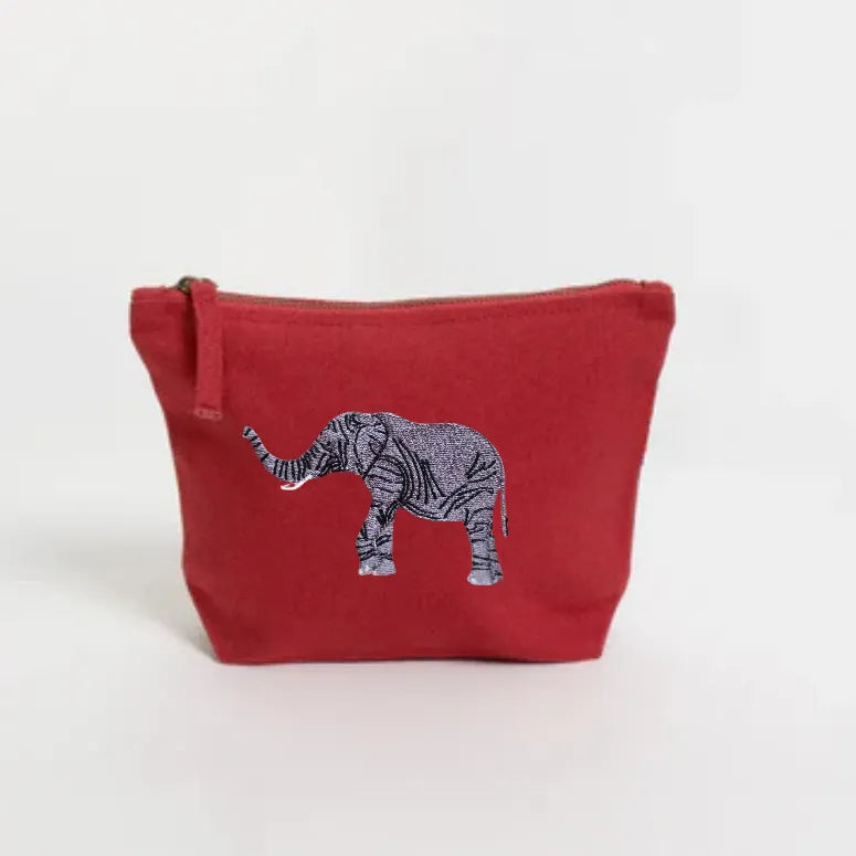 Handmade ILISAH Elephant Make Up Pouch in Burnt Orange, a compact canvas organizer for makeup and travel essentials.