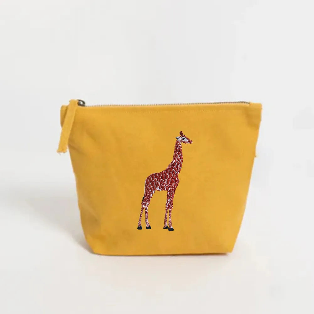 Handmade ILISAH Giraffe Make Up Pouch in white canvas, perfect for organizing makeup or travel essentials, small yet funct...