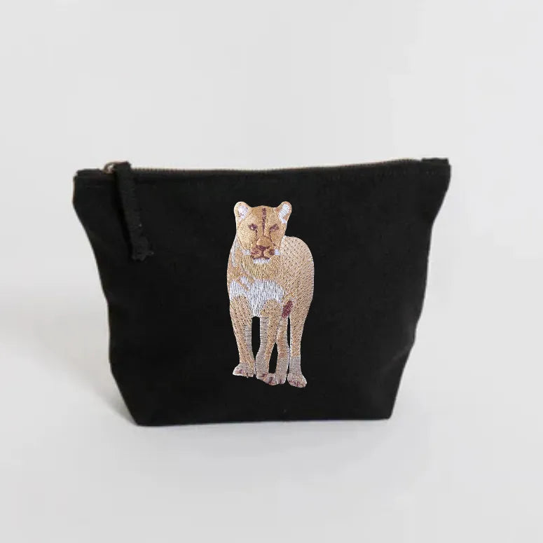 Handmade ILISAH Lion Make Up Pouch in Burnt Orange, a compact canvas bag for organizing makeup and essentials.