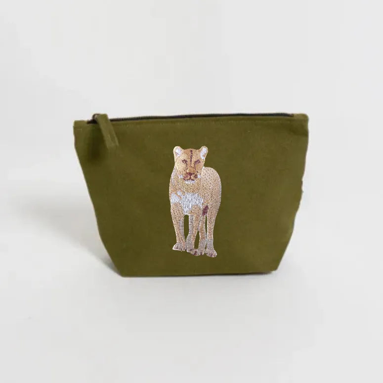 Handmade ILISAH Lion Make Up Pouch in Burnt Orange, a compact canvas bag for organizing makeup and essentials.
