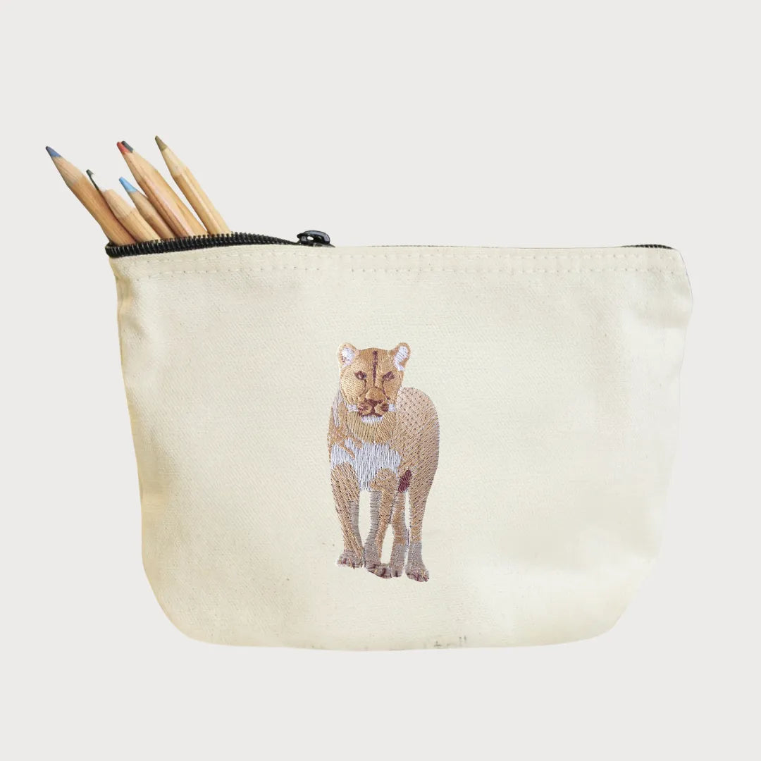 Handmade ILISAH Lion Make Up Pouch in Burnt Orange, a compact canvas bag for organizing makeup and essentials.