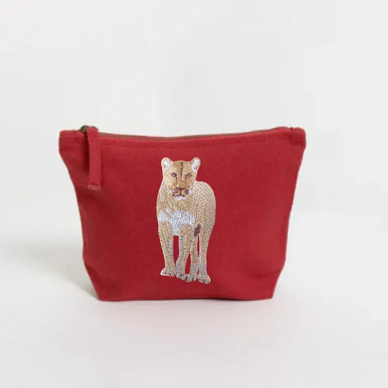 Handmade ILISAH Lion Make Up Pouch in Burnt Orange, a compact canvas bag for organizing makeup and essentials.