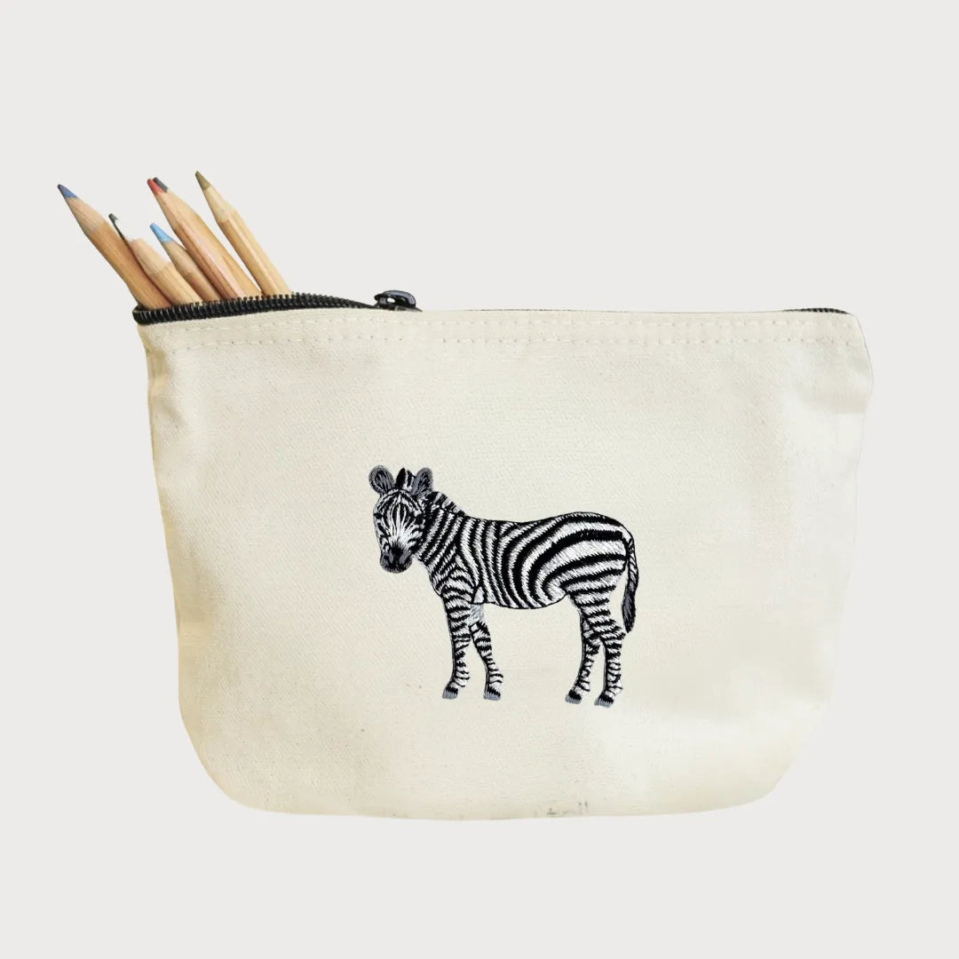Handmade ILISAH Zebra Make Up Pouch in white canvas, perfect for organizing makeup and essentials, ideal for travel or eve...
